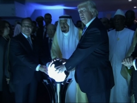 Video still: Trump Sisi Salman Hands Over the World